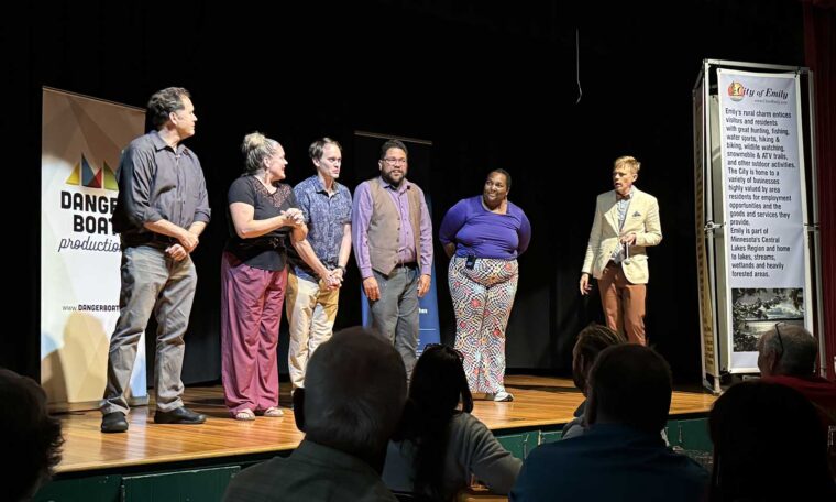 Members of the Danger Boat Improv Troupe react to a prompt given to them by Tane Danger at a Sketches of Minnesota event in Emily, Minnesota.