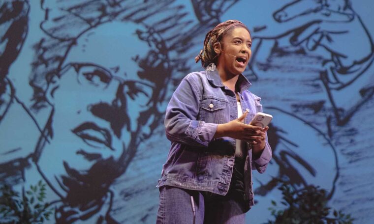 An actor delivers a monologue during a performance of Kumbayah the Juneteenth Story at The O'Shaughnessy at St. Catherine's University in St. Paul.
